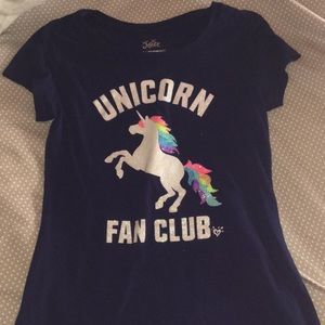 Justice shirt with unicorn fan club on the front.